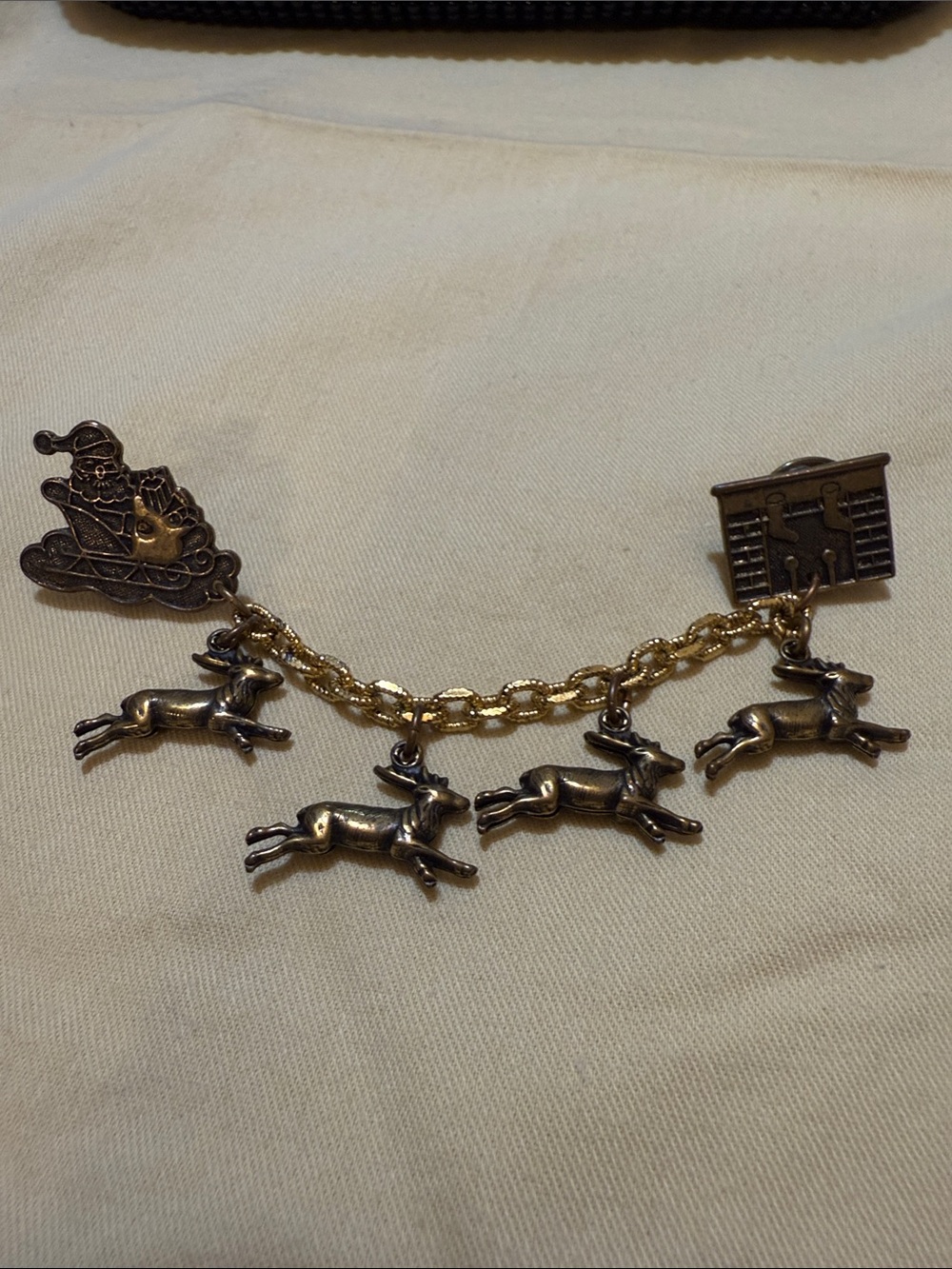 Gold-Tone Reindeer and Santa Sleigh Charm Pin